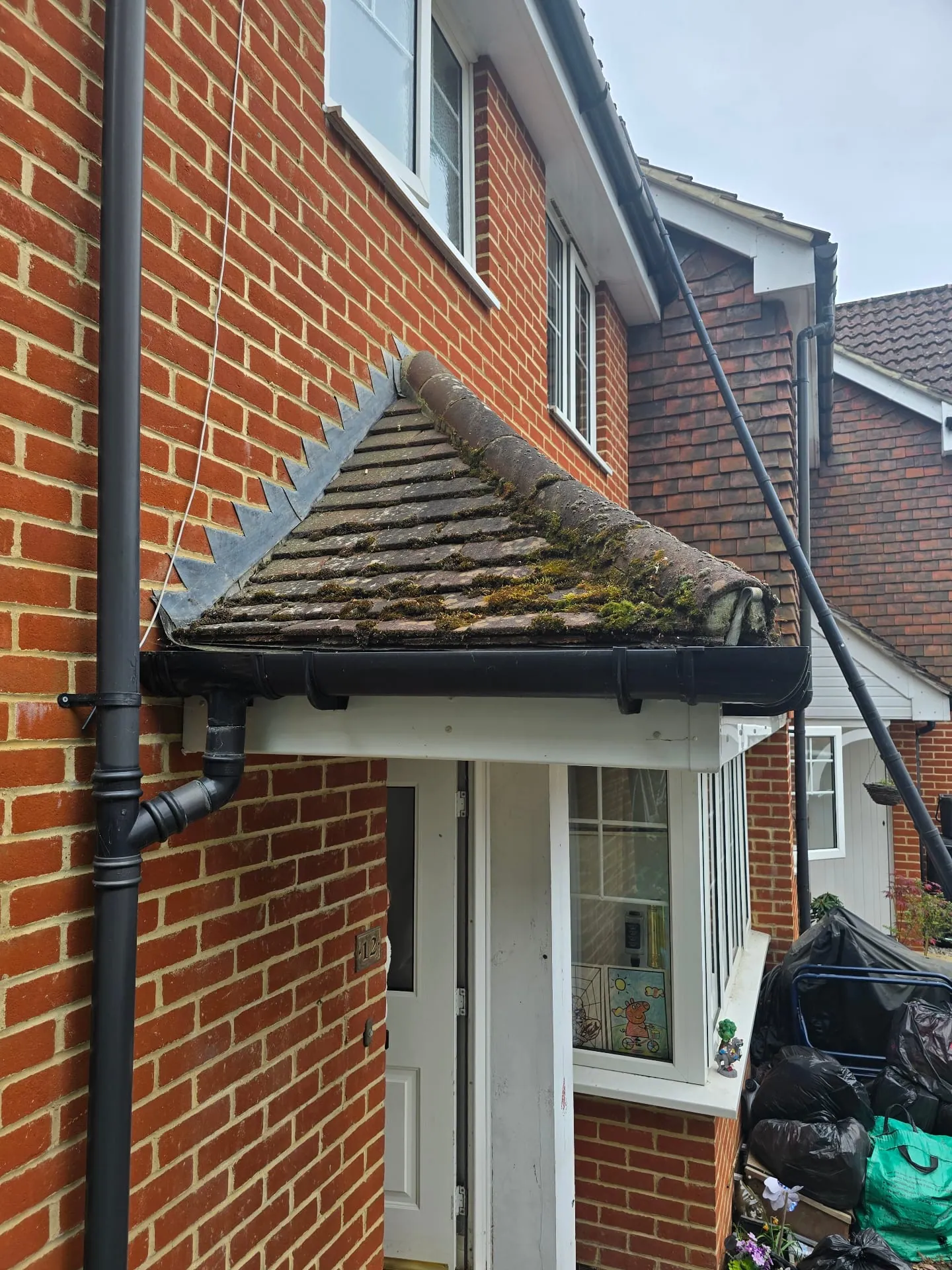 Before Porch Roof Cleaning